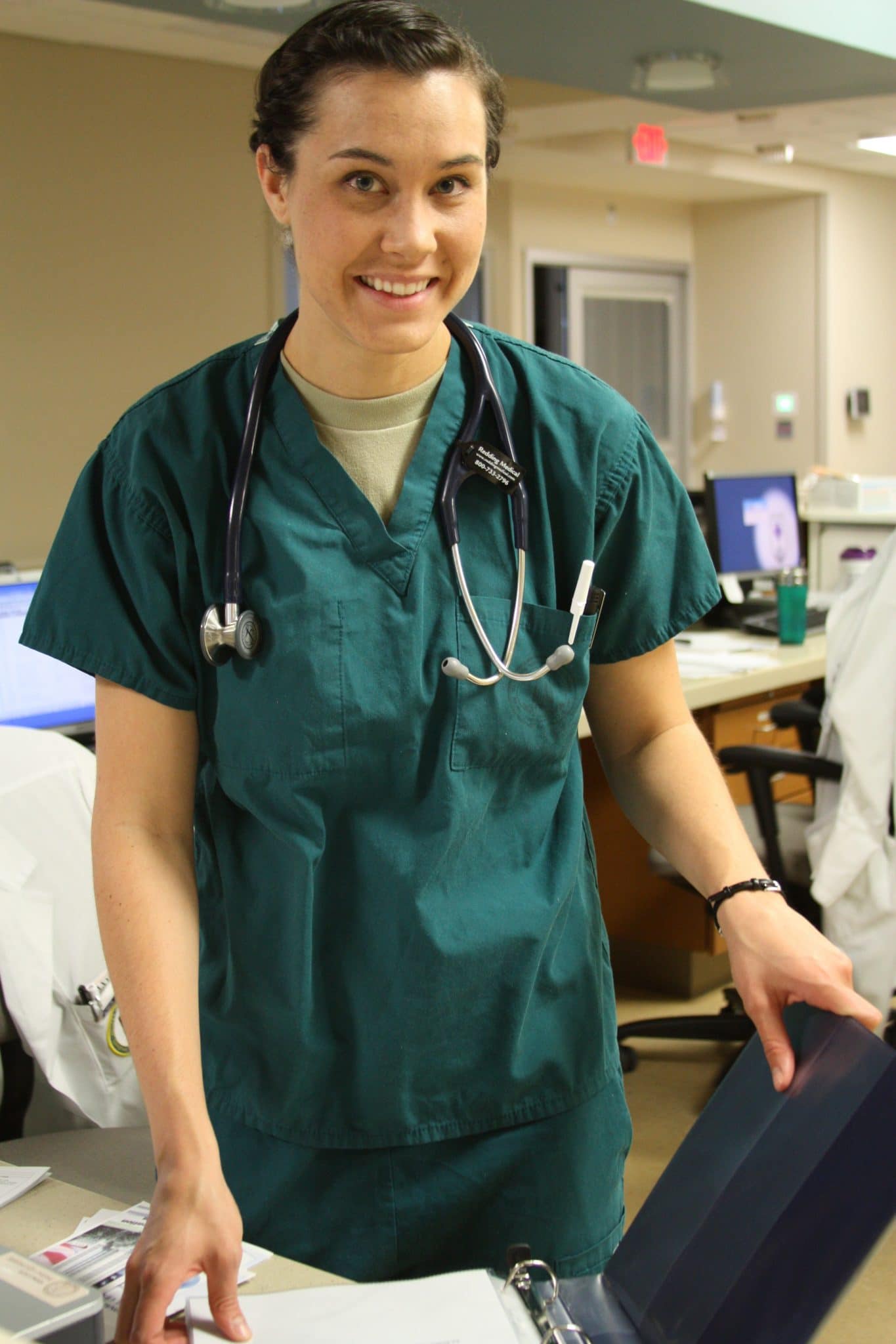 Female healthcare worker at her desk