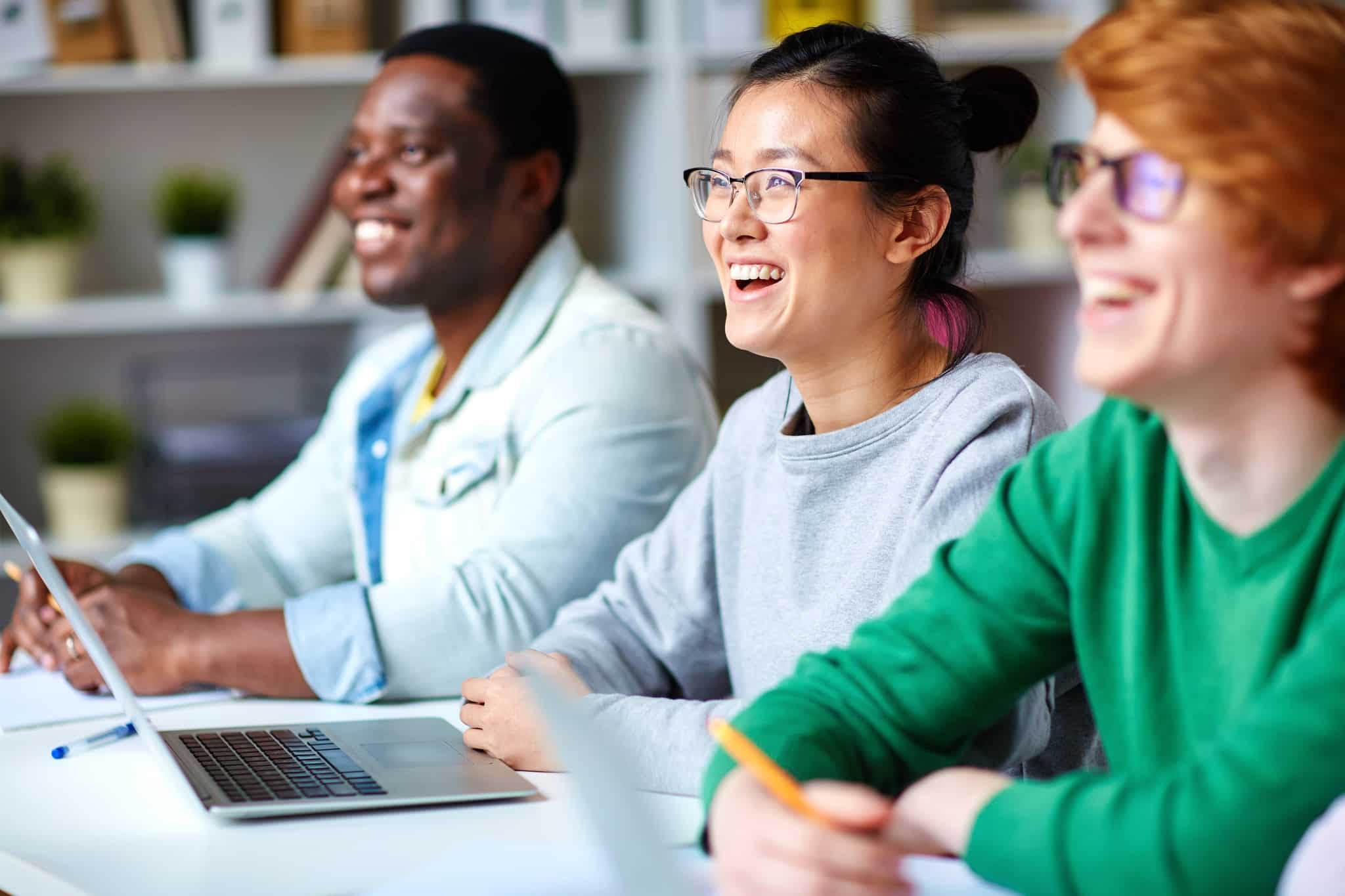 Ecstatic students smiling and laughing
