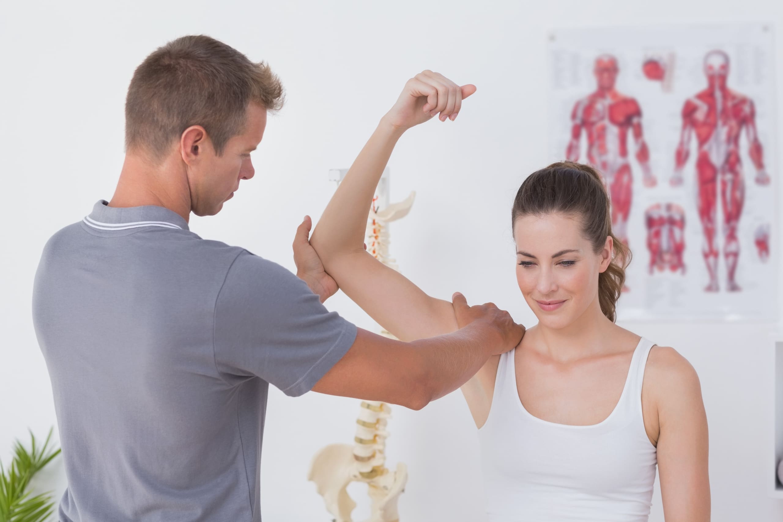 Physical Therapist stretching a patient's arm