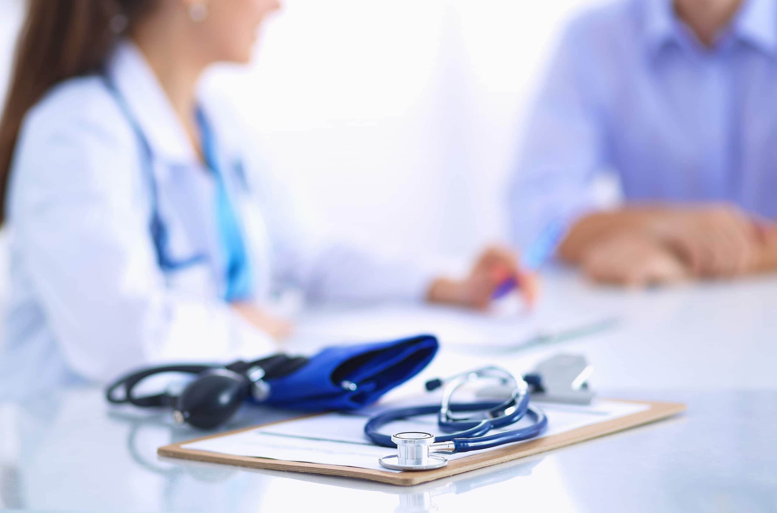 Close up of stethoscope and clipboard