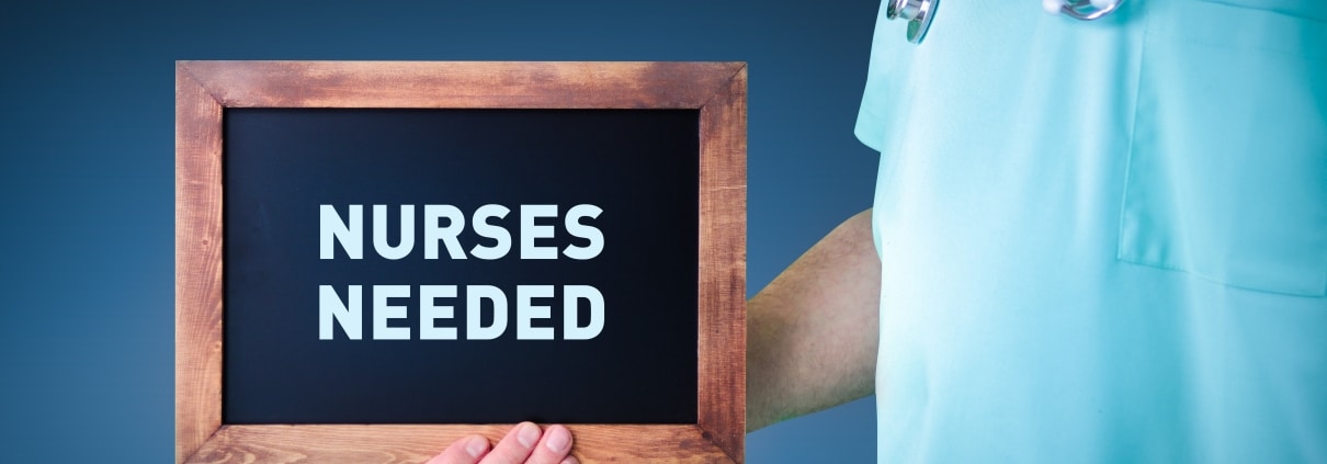 A sign that says nurses needed
