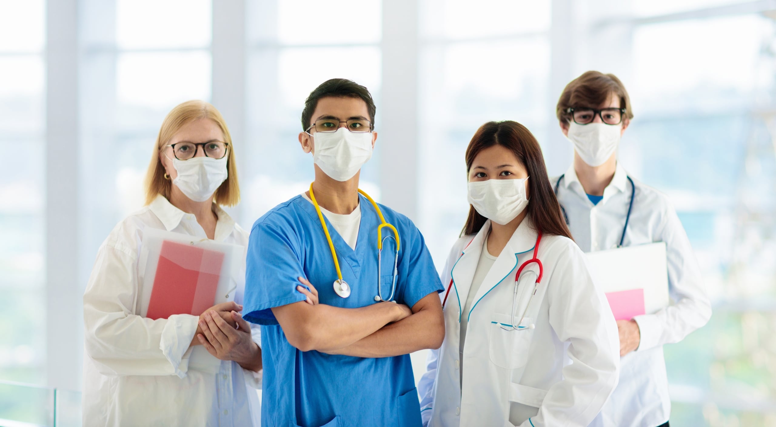 Group of medical professionals in masks