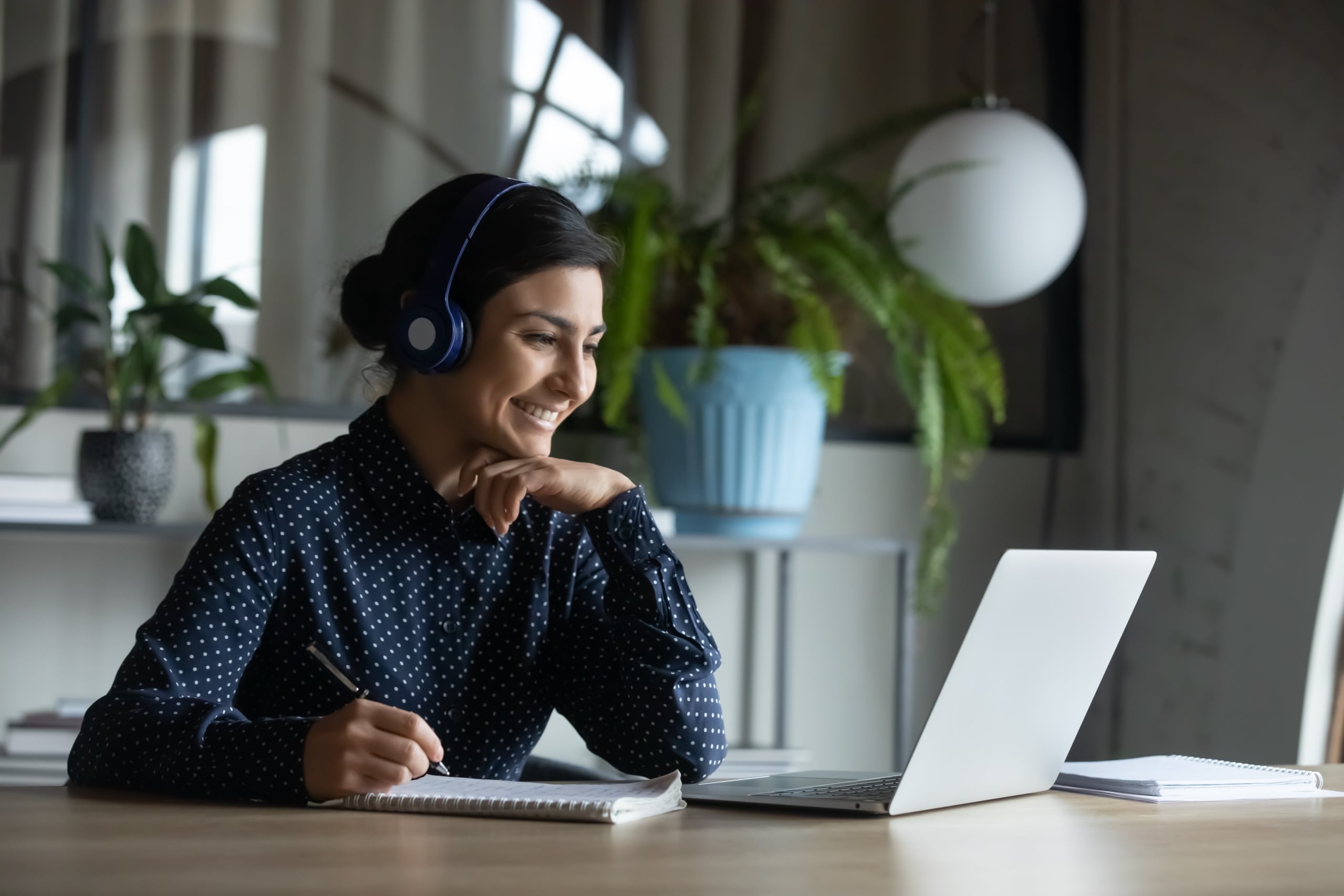 Young Indian woman using a laptop