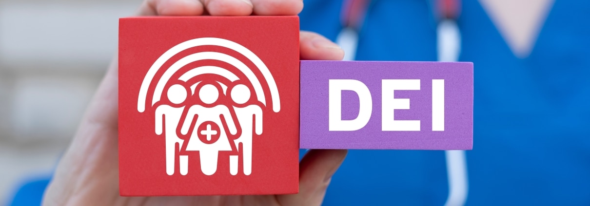 Nurse holding DEI blocks for diversity