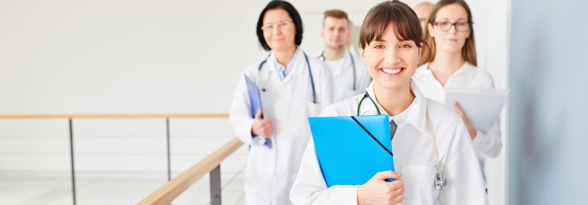 Group of medical professionals in a hallway