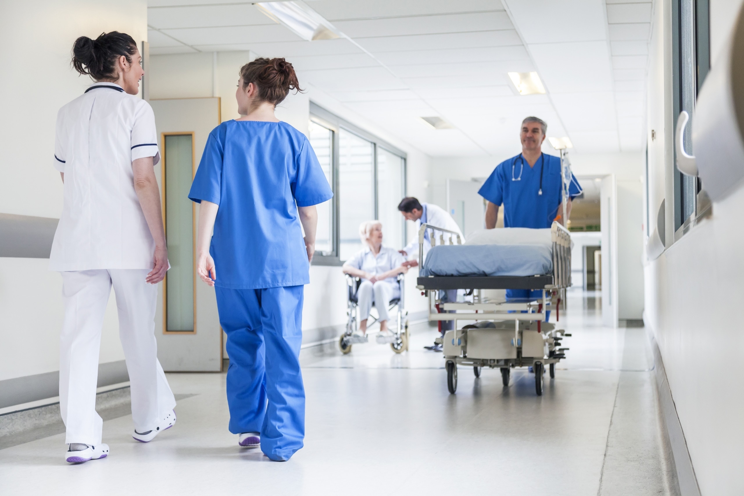 Nurses walking in a hospital hallway