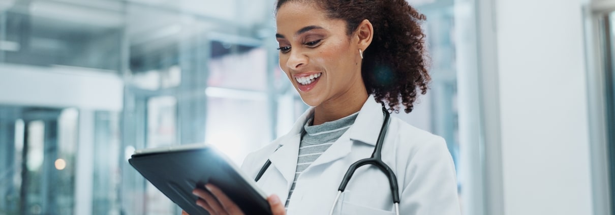 African-American medical professional using a tablet