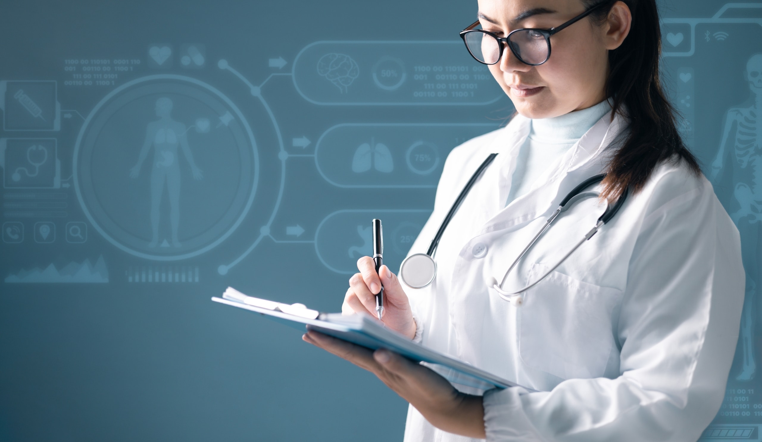 Asian medical professional completing paperwork next to digital concepts