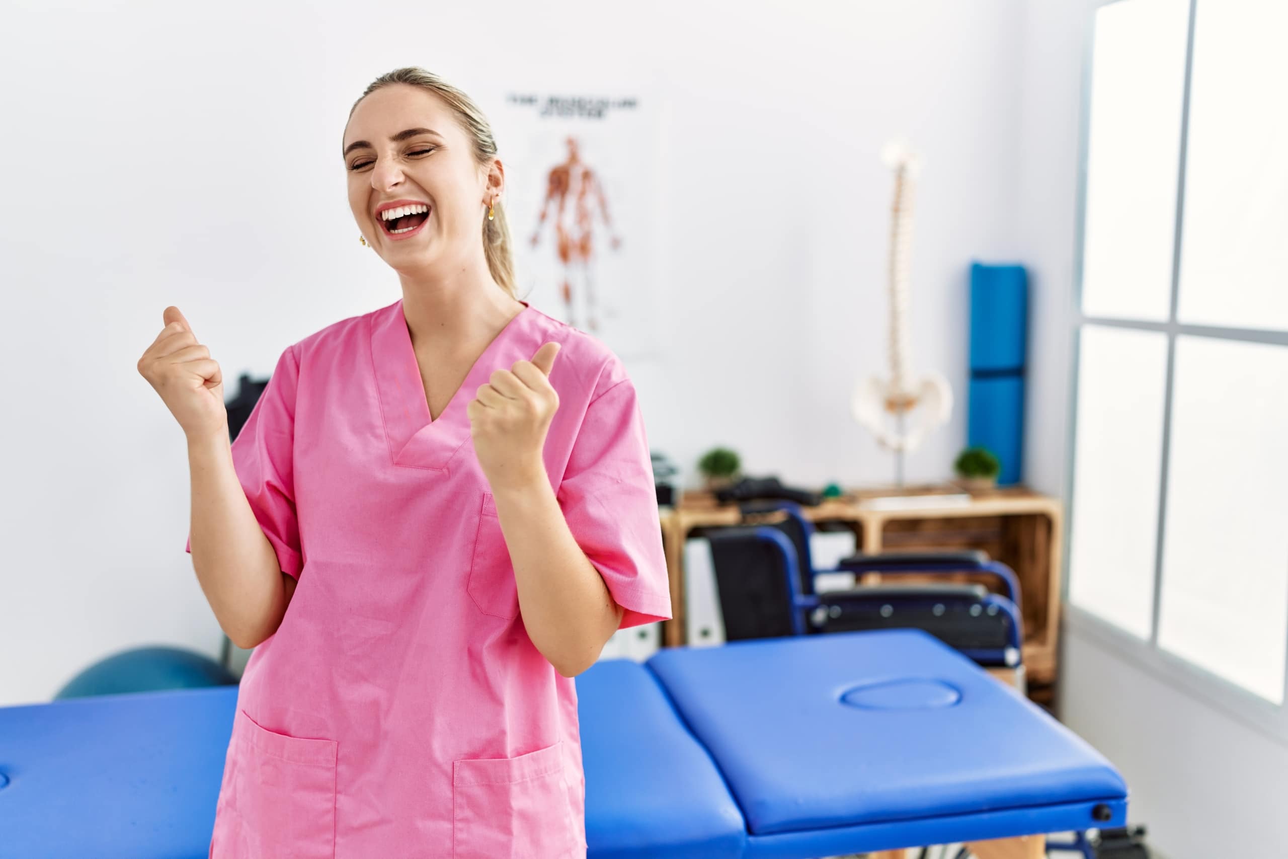 Blonde woman working at a pain recovery clinic